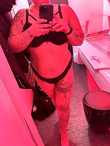 A very sexy woman is naked in these photographs.