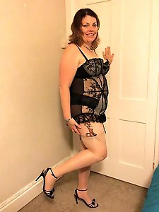 Full frilly body with stockings and suspenders