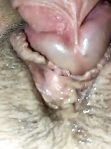 Stroking cock against clitoris