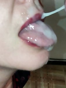 A mature woman performs oral sex and swallows semen