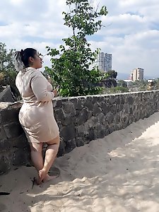 A confident mature woman prepares for intimacy