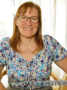 A brunette mother performs a flawless oral sex act during a gangbang