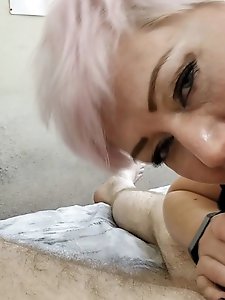 Aimee, a sexy mature woman, giving oral pleasure to a man