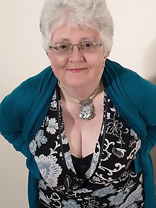 Naughty big breasted british granny getting frisky
